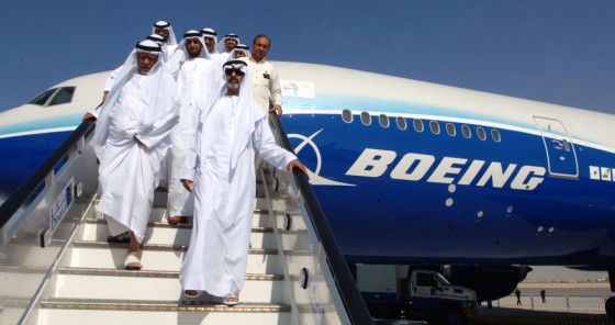 Sheikh Nahyan Bin Mubarak Al Nahyan, U.A.E. minister of education, leads a group of visitors out of a Boeing 777 exhibited at the Dubai Air Show in November.