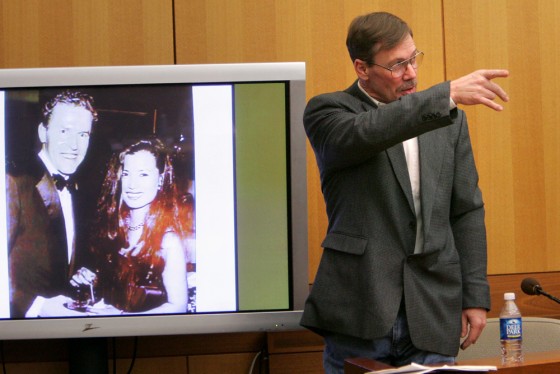 Phillip Harwood, the hit man who admitted killing James Sullivan's wife, addresses Sullivan in Atlanta on Monday.