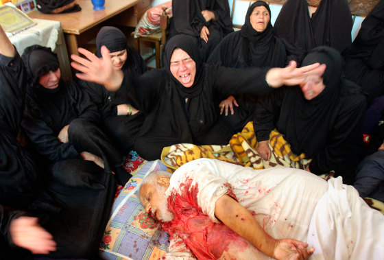 Iraqi women mourn the death of Khadim Sarhid al-Hemaiyem, the leader of the Sunni Batta tribe and brother of a candidate in the December election, in Baghdad, Iraq, in this November photo.