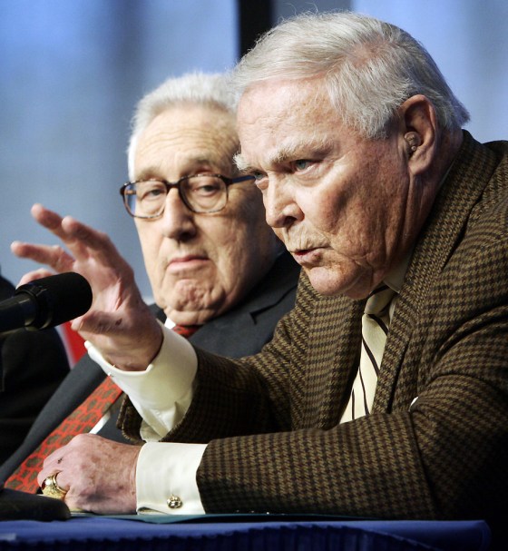 Henry Kissinger listens to General Alexander Haig at the Vietnam and the Presidency conference in Boston