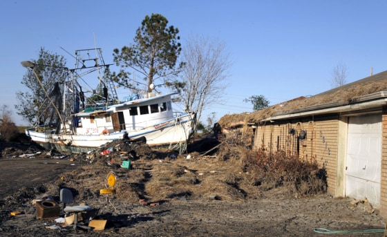 Commercial fishing boat lies on residential street in St. Bernard Parish east of New Orleans