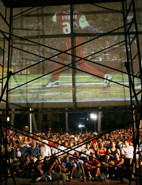 Cubans watch the World Baseball Classic final game between Cuba and Japan in Havana on Monday night.
