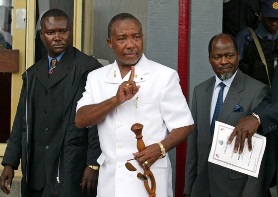 File photo of Liberia's former President Charles Taylor leaving for Nigeria