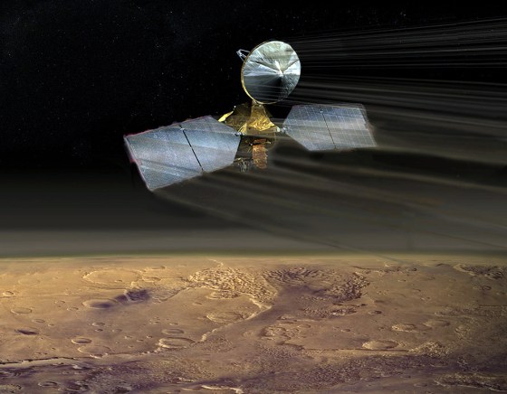 An artist's conception shows the Mars Reconnaissance Orbiter dipping through the Martian atmosphere during aerobraking. Mission managers said the orbiter successfully concluded its aerobraking phase Wednesday.