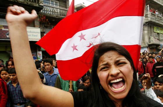 An opposition party supporter demonstrates against King Gyanendra in Katmandu, Nepal, on Wednesday as bloody protests continued for a third week.