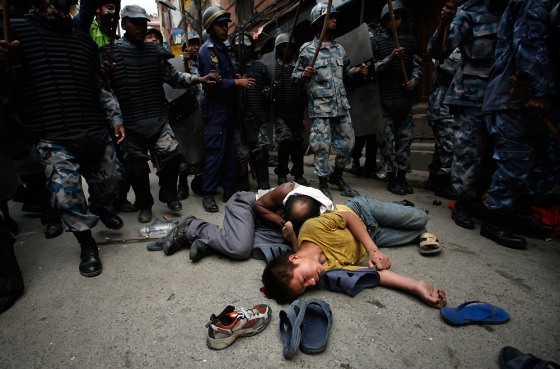 Nepalese pro-democracy protestors lie in