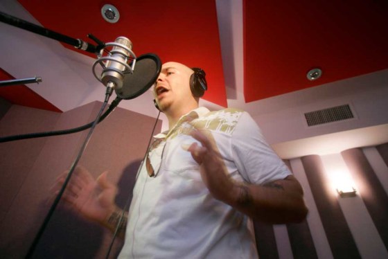 Hip-hop star Pitbull is among the artists on the Spanish-language version of the U.S. national anthem.