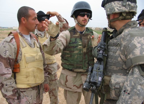 Lt. Aaron Tapalman, 23, argues with some Iraqi soldiers about who will deal with a suspected roadside bomb on a highway near the northern city of Hawijah.