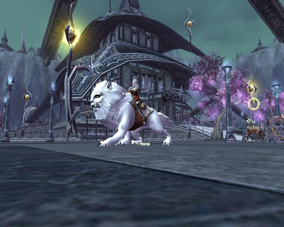 An elf character rides a mount through the city in this screenshot from the upcoming game "Archlord."