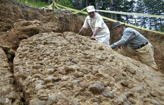 Geologists Berekat talks to Bosnian amateur archeologist Semir Osmanagic at northeastern side of Visocica hill in central Bosnia