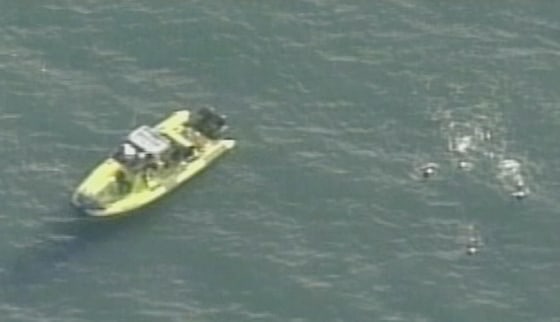 Second-grader Braxton Bilbrey, shown in the water, on Monday became one of the youngest ever to swim from Alcatraz Island to San Francisco’s Aquatic Park.