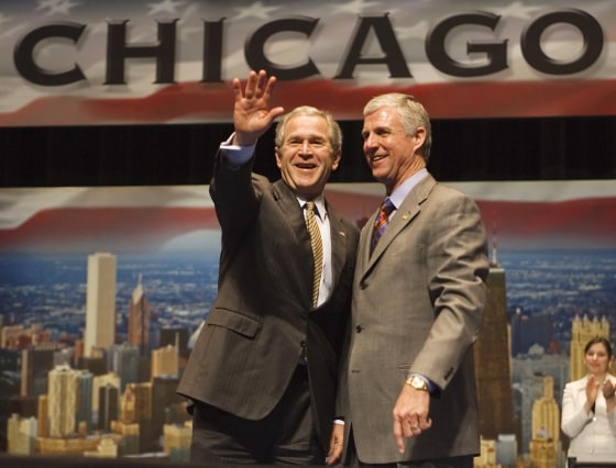 US President George W. Bush waves to the
