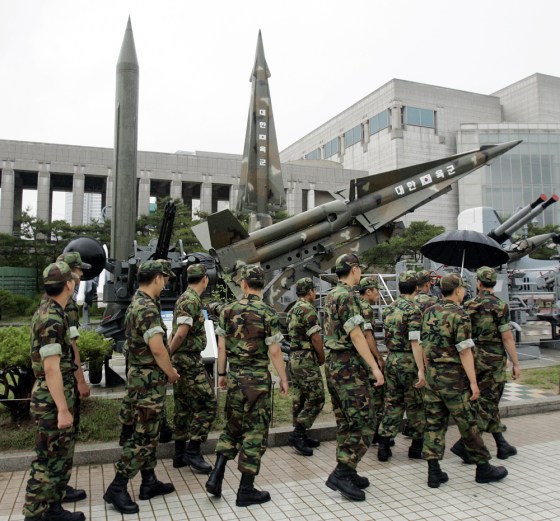 South Korean soldiers walk by displays of models of North Korea's Scud-B missile, left, and other South Korean missiles at the Korea War Memorial Museum in Seoul, South Korea, on Wednesday.