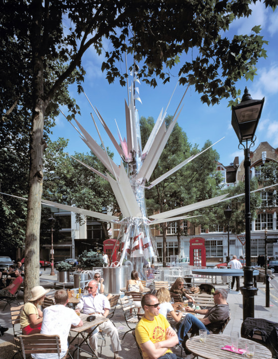 London Oasis, a sculpture with a wind turbine on top and solar panels on its branches, has been installed in a London square.