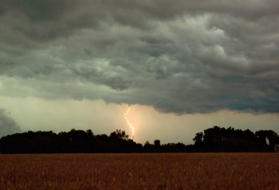 This lightning in Huron Township, Ohio, on Wednesday was part of a storm system that knocked out power and flooded roads.