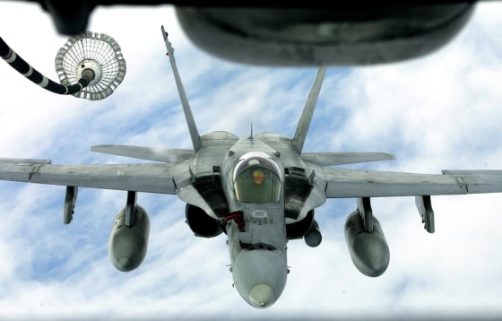 An FA 18 Hornet approaches to get airborne refueling during the Valiant Shield 06 exercises in the Pacific Ocean off Guam Friday. The five-day exercises brought together an armada of three aircraft carriers and 25 other ships, along with 22,000 troops and 280 warplanes.