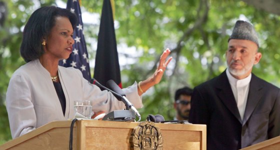 US Secretary of State Rice speaks as Afghan President Karzai looks on during news conference in Kabu