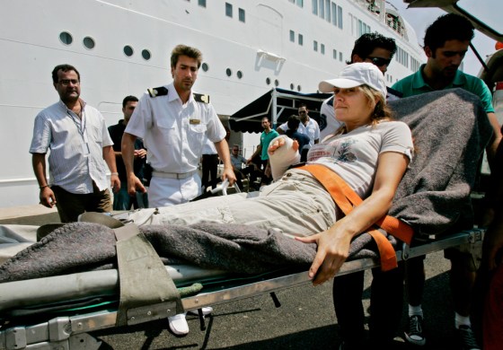 An American woman is stretchered onto the Orient Queen cruise ship in Beirut on Wednesday. The boat was chartered by the U.S. government to evacuate Americans trapped in Lebanon by the ongoing Israel-Hezbollah conflict.