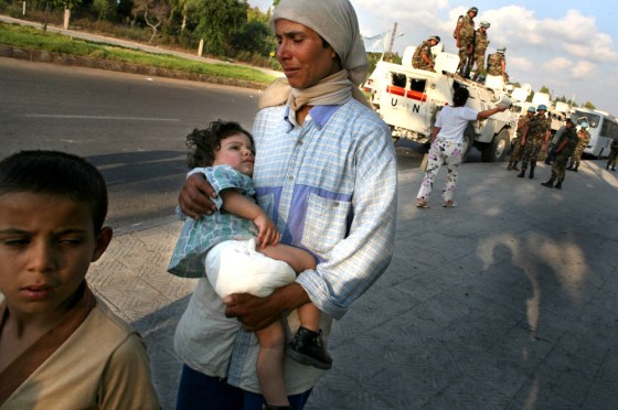 A convoy brought displaced persons from the embattled Christian town of Rmeish and Yaroun to Tyre in southern Lebanon.
