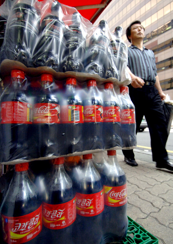 A South Korean pedestrian walk past by b