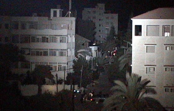 Palestinian protesters stormed the U.N. compound, left, in Gaza City on Sunday during a protest against Israel’s bombing of a building in southern Lebanon that killed around 60 people, witnesses and U.N. staff said. 