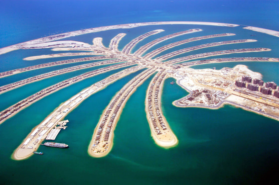 In this photo released by Nakheel Development, construction goes on at Jumeira Palm Island in Dubai, United Arab Emirates.