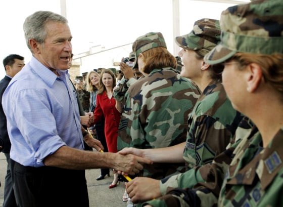 U.S. President George W. Bush greets military personnel upon arriving at Kessler Air Force Base in Biloxi