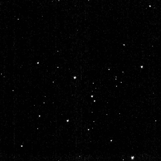 This image from the New Horizons probe's high-resolution camera shows the star cluster known as Messier 7. The camera is to take pictures of Jupiter next week in preparation for a February flyby.