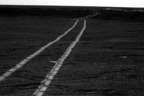 Making tracks! Opportunity robot wheels across the sandy stretch of landscape at Meridiani Planum en route to Victoria Crater.