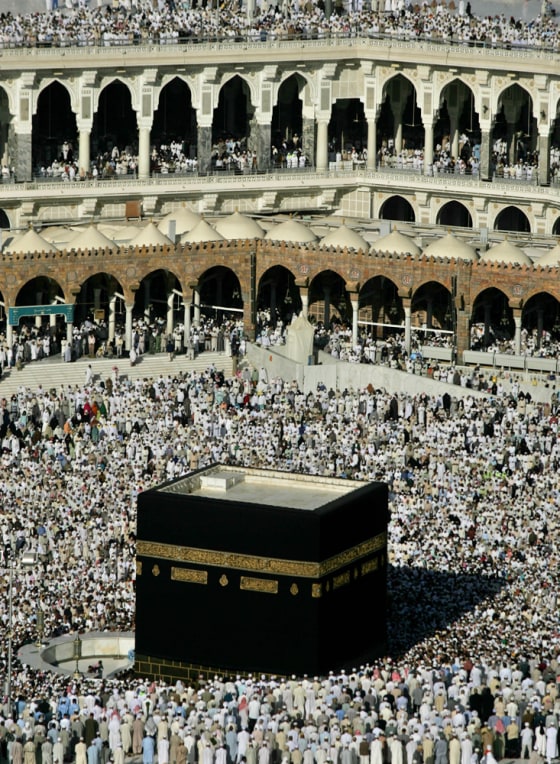 Muslim pilgrims pray and circle the Kaaba, center, inside the Grand Mosque, Islam's holiest shrine, to complete the pilgrimage known as the Hajj in Mecca, Saudi Arabia, in this Jan. 14 photo. Officials are considering a proposal to ban women from performing the five Muslim prayers in the immediate vicinity of the mosque.