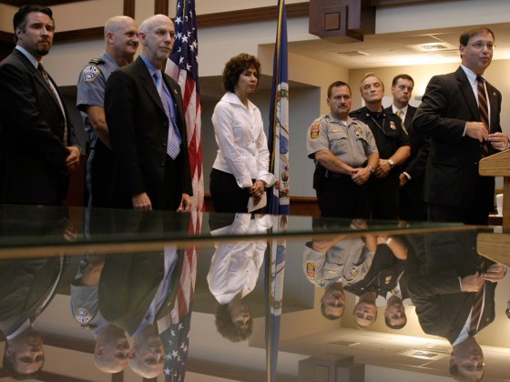 Federal and local authorities announce the arrests and details of a major marriage fraud case at the Arlington County Courthouse, in Virginia, on Thursday.