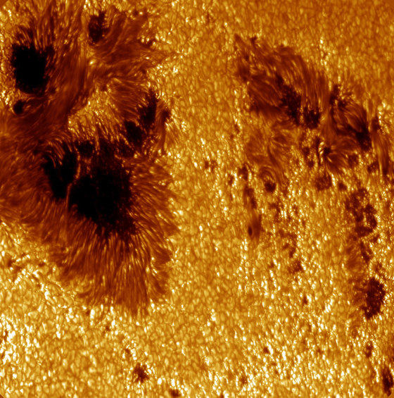 A closeup image of the sun shows magnetic patches that cause variations in the sun's brightness. 