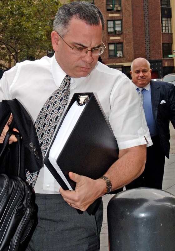John Gotti Jr. enters Manhattan federal court with his attorney Charles Carnesi, background, on Sept. 5.
