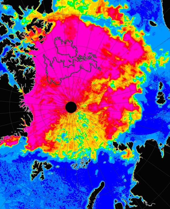 A color-coded image from the EOS Aqua satellite shows ice thickness in the Arctic. Red and pink indicate 100 percent ice concentration. Yellow, orange and green indicate fissures and openings in the ice. The outline of the British Isles is superimposed over the picture to provide a sense of scale.