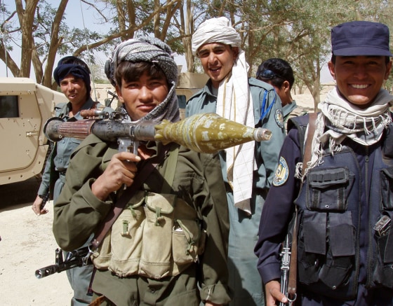 Five years after the U.S. and its allies invaded in the wake of 9/11, the struggle to create lasting stability in Afghanistan continues. Part of the solution, say American and Afghan officials, is in the creation of locally based security forces. Here, young Afghans who have signed up for the expanding national army and police forces, show off their new uniforms and weapons.