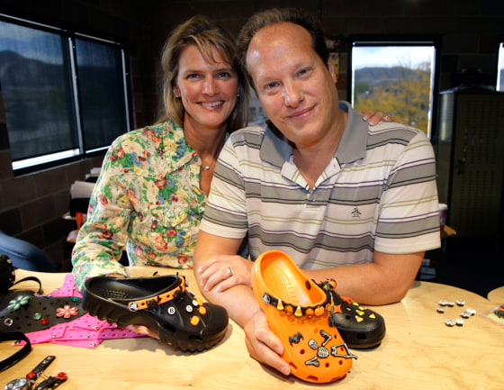 Crocs with pins on them top