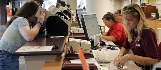 States say the Real ID Act will cost DMVs, like this one in Columbus, Ohio, a total of $11 billion.