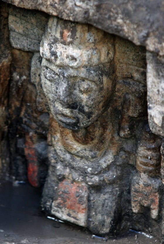 A part of an uncovered altar shows a frieze of an agricultural deity in Mexico City