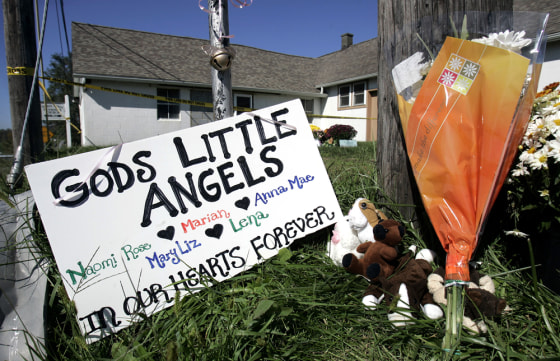 A makeshift memorial is seen on Mine Road in Nickel Mines, Pa., Sunday for the girls slain in an Amish school shooting on Monday just down the road.