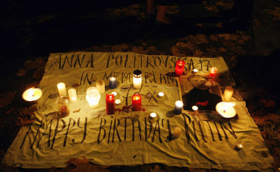 Candles are placed in memory of murdered Russian journalist Anna Politkovskaya, outside Russian embassy in Helsinki