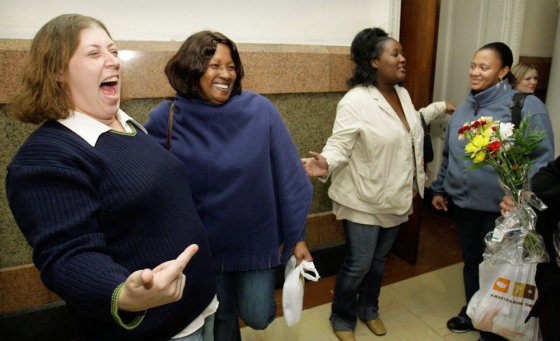 Plaintiffs, Michele Braun, left, Patricia Holley, Jacqueline Copeland, and Delores Killingsworth-Barber react after the jury's decision.