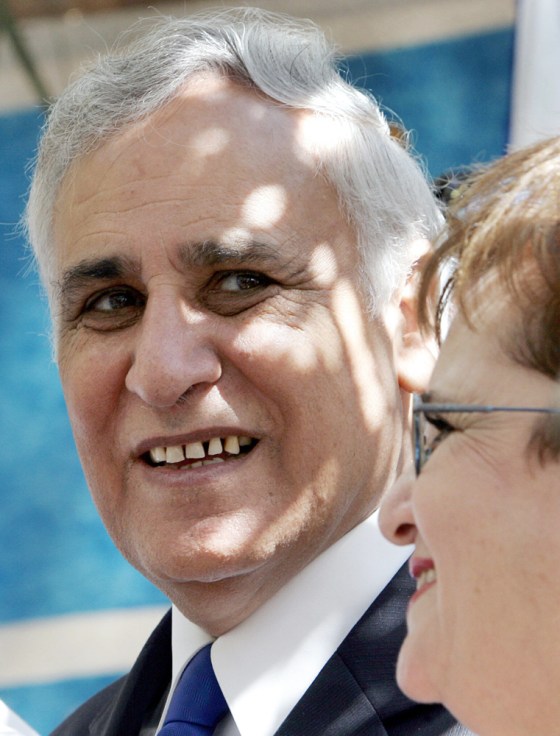 Israeli President Moshe Katzav greets we