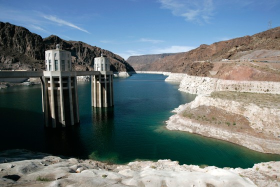The drop in water levels due to drought on Lake Mead can be seen by the white ring around the shore at Hoover Dam in this July 21 photo, taken in Boulder City, Nev. Boaters and swimmers have grown accustomed to the rings around Lake Mead and Lake Powell in Arizona and Utah that show where the water used to be, before drought brought the levels down.