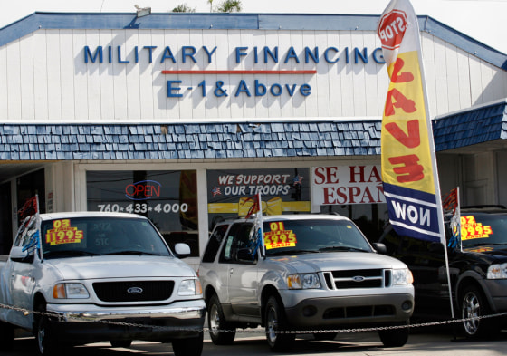 A used car dealership in Oceanside, Calif., offers financing to members of the armed forces. The lot is one of many businesses in downtown Oceanside offering credit to Marines from nearby Camp Pendleton.
