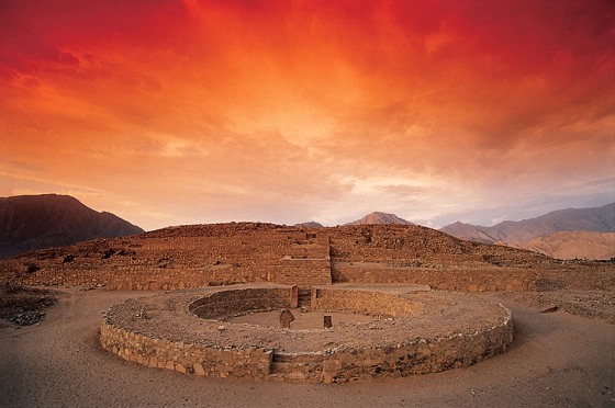 The ruins of Caral, dating back to 2600 B.C., are spread out beneath the sky in Peru. Caral was once a thriving city, but the civilization that built it fell prey to a series of natural disasters, scientists say.