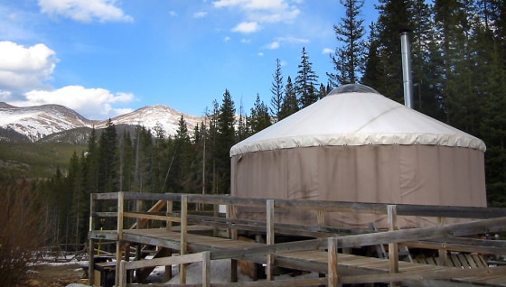 The Dancing Moose yurt commands a view of high peaks at Colorado State Forest outside Walden, Colo. Modeled after nomadic shelters from Central Asia, the yurt is one of six in the forest and a lodging option gaining popularity with outdoor vacationers nationwide.