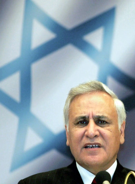 Israeli President Moshe Katsav addresses a meeting of officials of the German Jewish Community in this photo taken in Berlin, Monday, May 30, 2005. Israel's attorney general Meni Mazuz said Sunday Katsav was obligated to step aside pending the resolution of rape and other criminal allegations against him.