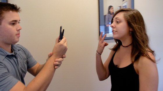 Kendal Stavros, 21, is filmed by Mark DiCristofaro as they make a movie using cellular telephones at the Boston University school of communications, Oct. 12.