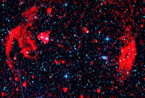 This image shows the VLA telescope radio images (in red) of enormous radio structures discovered by radio astronomer Joydeep Bagchi and colleagues.