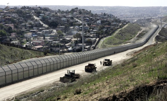The U.S.-Mexico border fence separating San Diego and Tijuana, Mexico. With the Democrats in control of Congress, Hispanic political activists are preparing for a big push for reform.